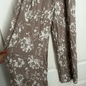 Baltic Born Floral Wide Leg pants in Brown and White thumbnail 2