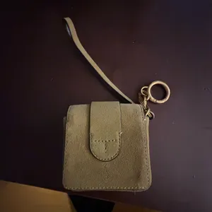 Tory Burch Sawyer mini bag key fob in suede with an oversized buckle and wristle thumbnail 3