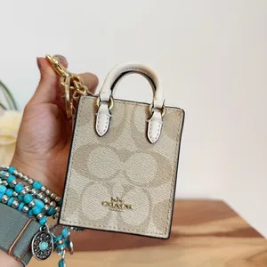 NWT Coach‎ North/South Mini Tote Bag Charm In Signature Canvas thumbnail 5