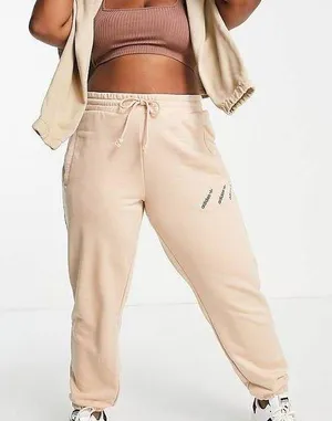 Adidas Originals 'Logomania' triple logo joggers in blush thumbnail 1