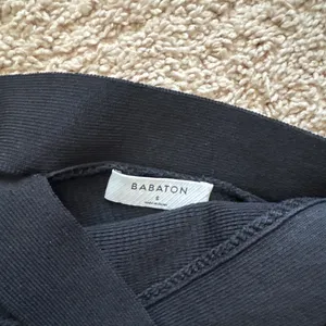 Aritzia Black Babaton criss cross tank top thumbnail 2