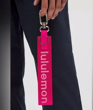 Lululemon NWT Never Lost Keychain (PSNT/WHT) SOLD OUT Color Code Pink & White thumbnail 1