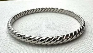 Silver tone twisted bangle bracelet thumbnail 1