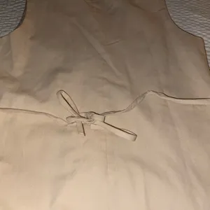 Sleeveless Beige Button thumbnail 4