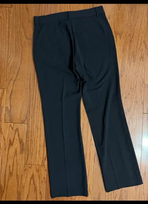 Nine West Black High waste/ wide leg pants - Size 8. Great pair of pants. Pockets on front & back. Gently warn & excellent condition. Mark on top is the iron over pockets, will wash out. Measurements approximately 16” waste x 11” rise x 39”. priced to sell at as is condition. None smoking home. Don’t like my price, make reasonable offer! thumbnail 2