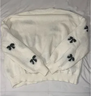 Cream sweater with black bows thumbnail 2