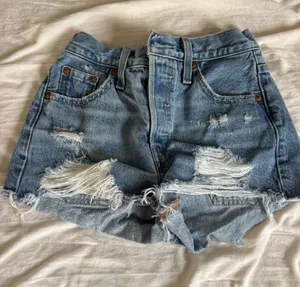 Levi's Distressed Light Blue Denim Cutoff Shorts thumbnail 1