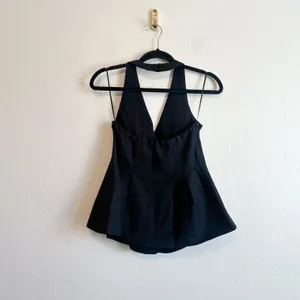 Reformation | Auli Halter Wool-Blend Peplum Vest Top in Black | size 2 thumbnail 6