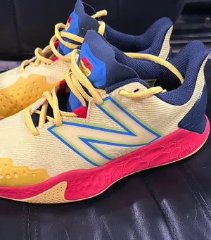 New Balance Fresh Foam X Lav V2 in the "Egg Yolk/True Red" colorway thumbnail 1