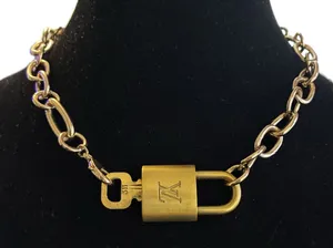 Gold toned Lock and Necklace thumbnail 1