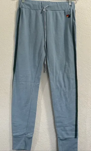 light blue Aviator Nation sweatpants featuring side striping Small soft warm thumbnail 1