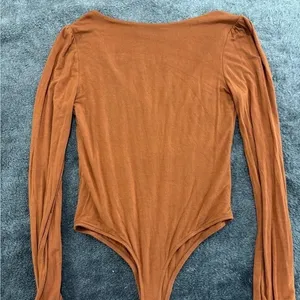 Lulus Rust Orange Deep V-Neck Long Sleeve Puff Shoulder Bodysuit Size Medium‎ thumbnail 7