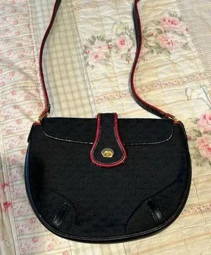Gucci vintage crossbody bag black with red trim. Beautiful inside has wear shown thumbnail 1