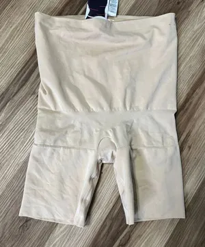 Spanx nude smoothing mid-thigh 1X shapewear shorts thumbnail 1