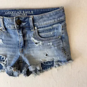 American Eagle Distressed Super Stretch Low Rise Shortie Denim Shorts Womens 2 thumbnail 7