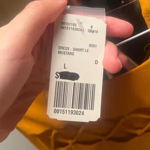 Forever 21 Yellow midi dress with lace in front #yellowdress #mididress Never worn and comes with extra button Size L but fits like a Medium thumbnail 5