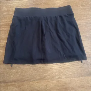 Fabletics Black Skort with Zipper Accents size medium short thumbnail 2