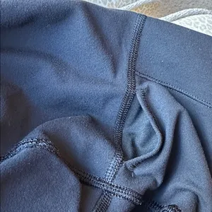 Lululemon Black Leggings with criss cross sheer panels down front of leg size 6 thumbnail 11