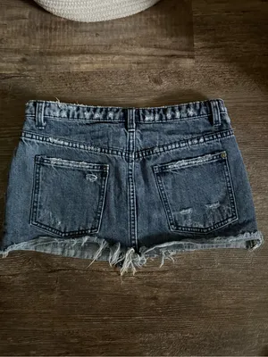 Free People distressed denim mini skirt with a frayed raw hem thumbnail 4
