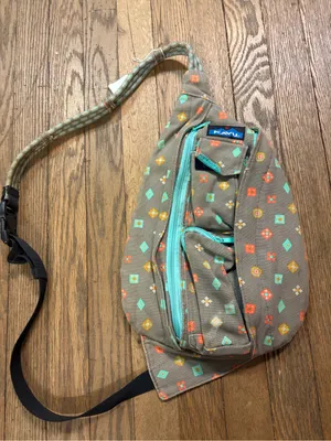 Kavu Sling Bag with Turquoise and Coral Accents thumbnail 1