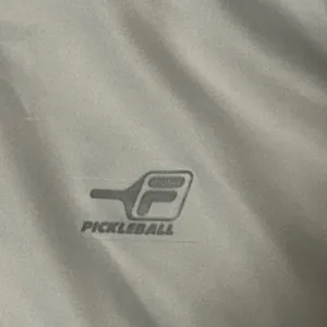 Fila Women’s pickleball quarter-zip pullover. It is a long-sleeve White Small‎ thumbnail 2