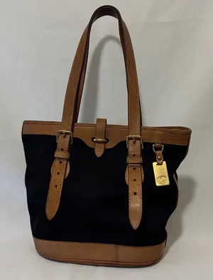Dooney & Bourke Cabriolet Bucket Shoulder Bag Black w/ Brown Leather Trim thumbnail 1