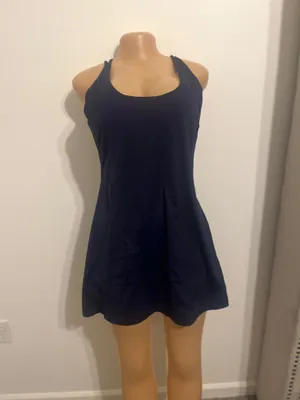 Chic sleeveless dress in a classic black color. Perfect for any occasion. thumbnail 4