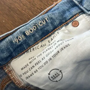 American Eagle '90's Boot Cut Distressed Denim Jeans 0 thumbnail 8