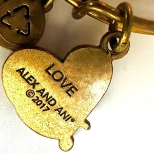 Alex and Ani love charm gold tone bangle bracelet thumbnail 7
