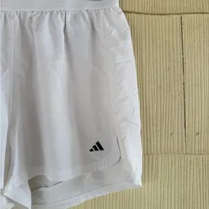 Adidas women’s HYGLM PACER shorts size MEDIUM/WHITE thumbnail 2