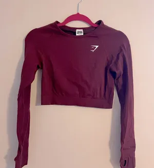 Gymshark NWOT Vital seamless crop 2.0 top in baked maroon marble ( discontinued) thumbnail 1