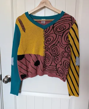 Nightmare Before Christmas Sally Cropped Knit Sweater Medium Blue/Yellow thumbnail 1