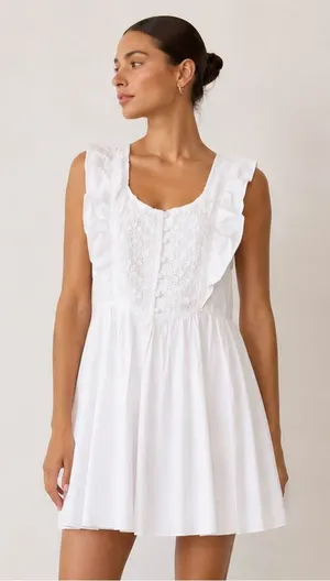 Free People “half moon”white mini dress with floral lace inset & ruffles.Size XS thumbnail 1