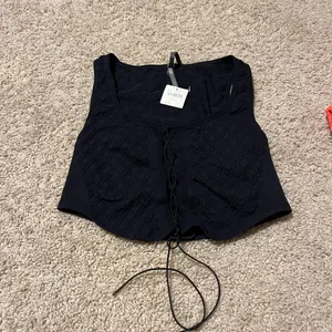 By Anthropologie Lace-Up front black Corset Top never worn thumbnail 3