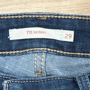 Levi's 711 Dark Blue Straight-Leg Distressed Jeans 399 thumbnail 4