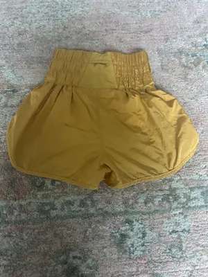 Yellow gold free people movement shorts thumbnail 2