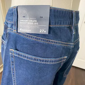 NWT American Eagle Dreamy Drapey Stretch Super High-Waisted Baggy Wide-Leg Jeans thumbnail 6