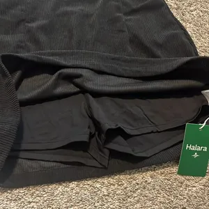 Halara High Waisted Invisible Zipper 2-in-1 A Line Mini Corduroy Black Skirt Med thumbnail 5