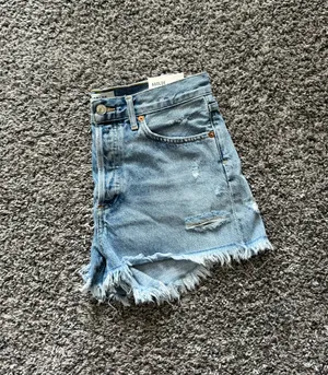 Agolde Parker Light Wash Distressed Denim Cutoff Shorts thumbnail 6