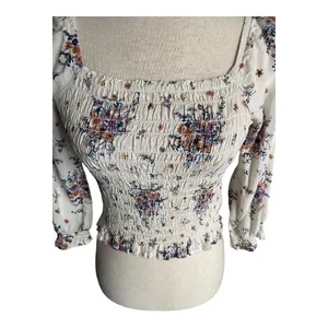 REWIND-CREAM COLOR FLORAL SMOCKED TOP-WOMENS SIZE SMALL Gorgeous top, fro t and back smocking, women’s size small, excellent condition Measurements: Bust: armpit to armpit 14-18 inches Length: shoulder seam to bottom 17 inches thumbnail 5