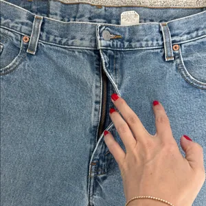 Vintage Levi’s 570 Y2K 90s high waist denim cutoff shorts thumbnail 3