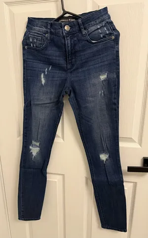 Express Women’s Dark Indigo Distressed Skinny Jeans thumbnail 1