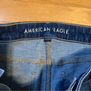 American Eagle Outfitters Low Rise Flare Stretch Jeans w Side Pockets Women’s 8 thumbnail 5