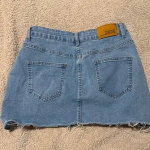 Distressed Denim Mini Skirt thumbnail 2