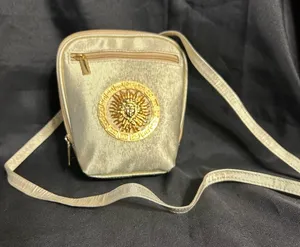 Celestial Sun Gold Crossbody Bag with Decorative Medallion thumbnail 1