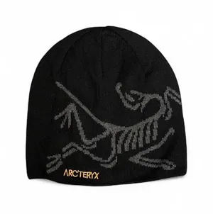 black and grey arcteryx bird head toque thumbnail 1