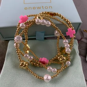 Enewton 4‑Piece Stackable Bracelet Set Gold Bead Pink Cross Pearl Detail thumbnail 3