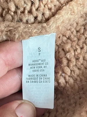 Aerie oversized chunky knit jumper in a pale peach/orange shade. thumbnail 5
