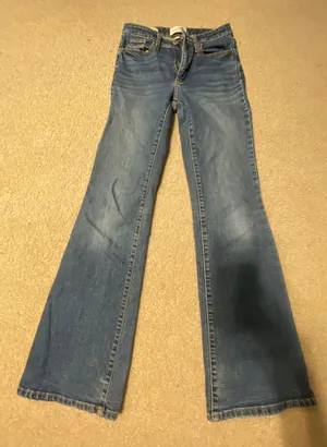 Universal Threads flare jeans thumbnail 1