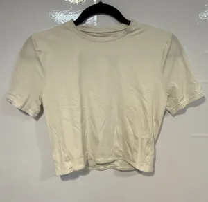 Lululemon Wundermost White opal short sleeve crop‎ shirt thumbnail 1